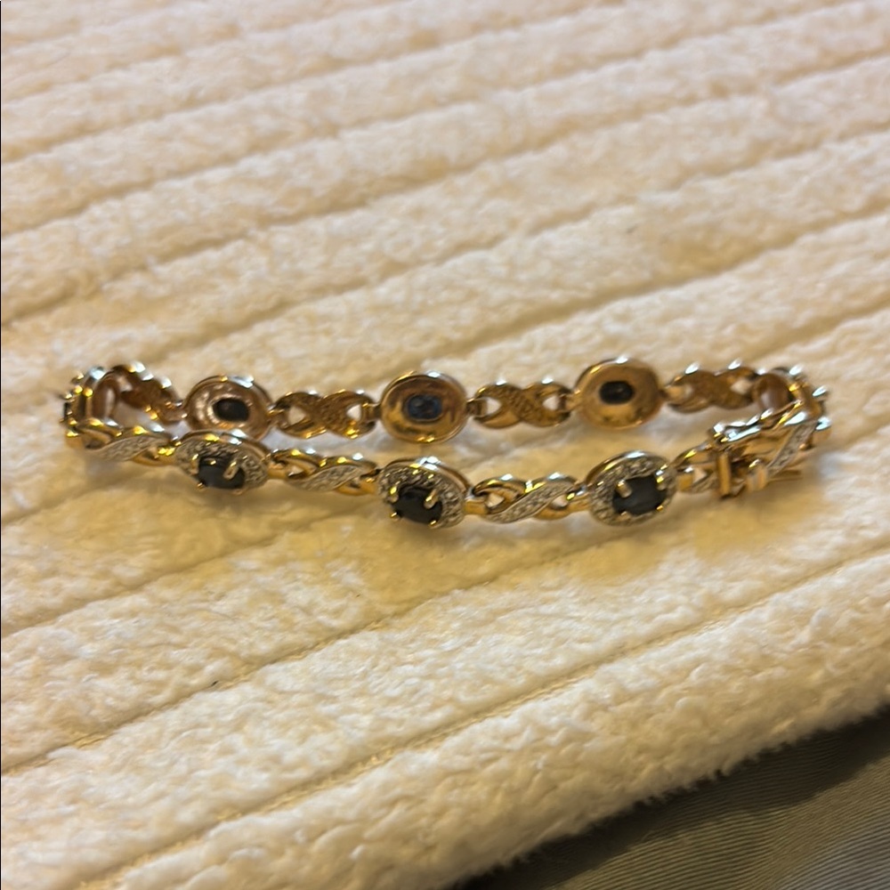 Elegant Gold and Black Bracelet